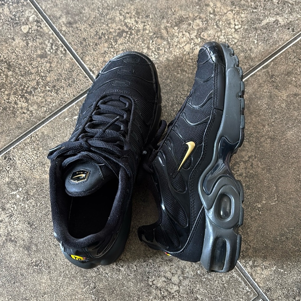 Nike Women's Black Sneakers with Gold Swoosh